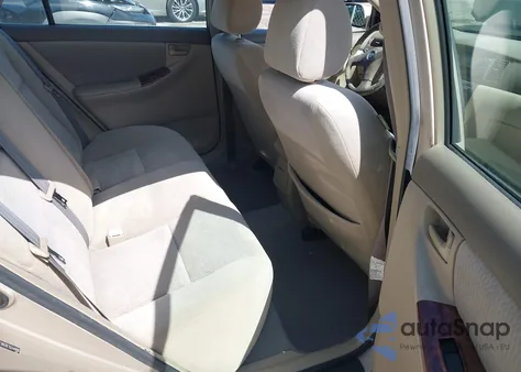 2005 Toyota Corolla Le z USA, uszkodzony, nr VIN 2T1BR30E15C448885